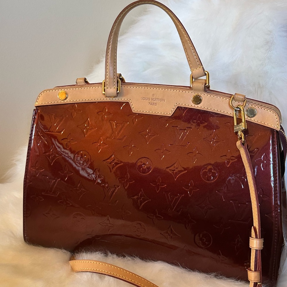 Burgundy Louis Vuitton bag